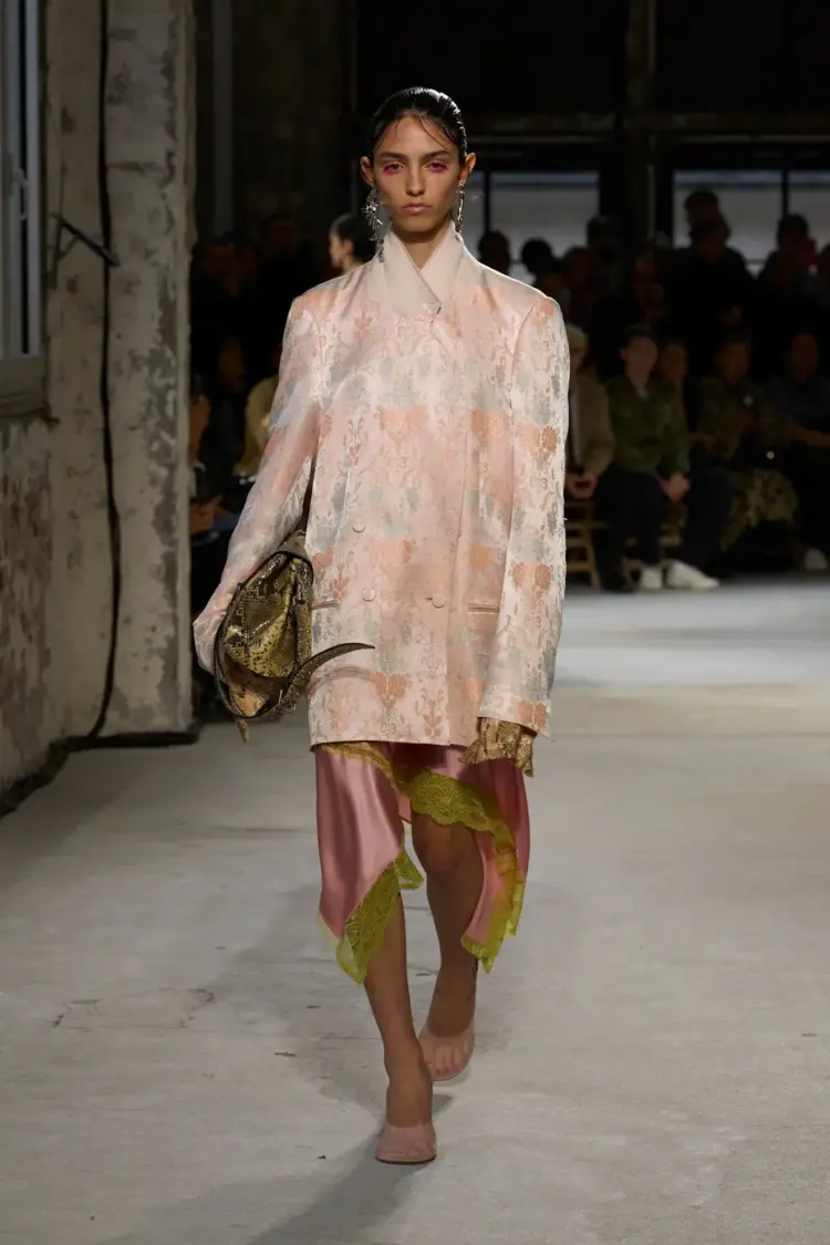 A runway look from Dries Van Noten featuring a lace-trimmed slip skirt