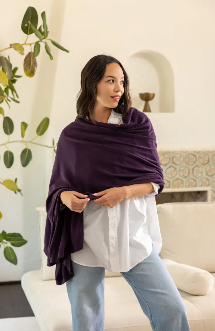 Shopping Online The Zestt Organics Travel Wrap in Blackberry worn by a model on the company website