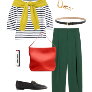 Breton stripe top with chartreuse cardigan tied at shoulders, green trousers, red hobo bag, and black loafers