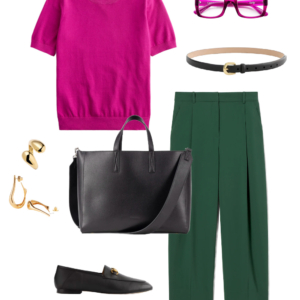 Magenta cashmere tee with green trousers, black leather tote, and loafers &mdash; a polished business travel look
